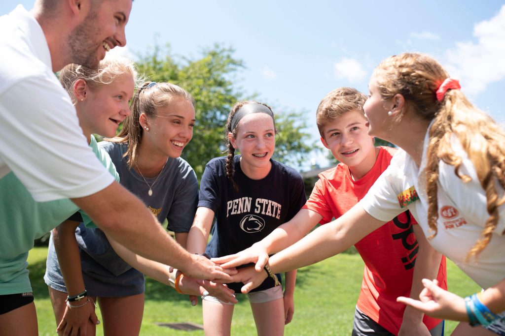 ESF Campers cheering each other on